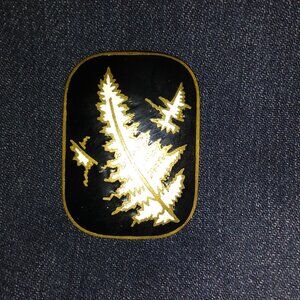 Enamel Black, White, and Gold Pin!